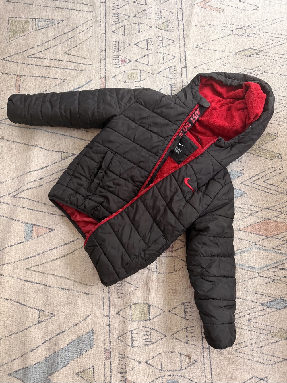 Nike Kids Black Puffer Jacket with Red Lining